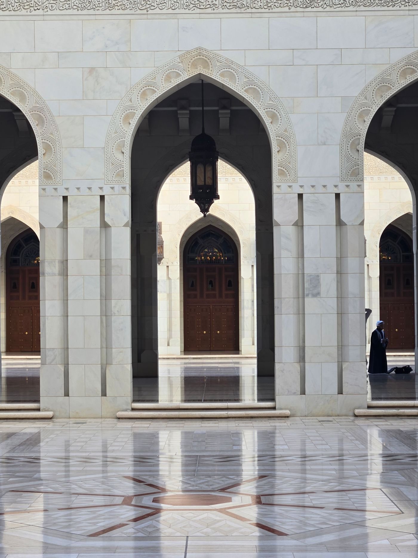Archway and marble-look tiled flooring, design inspiration