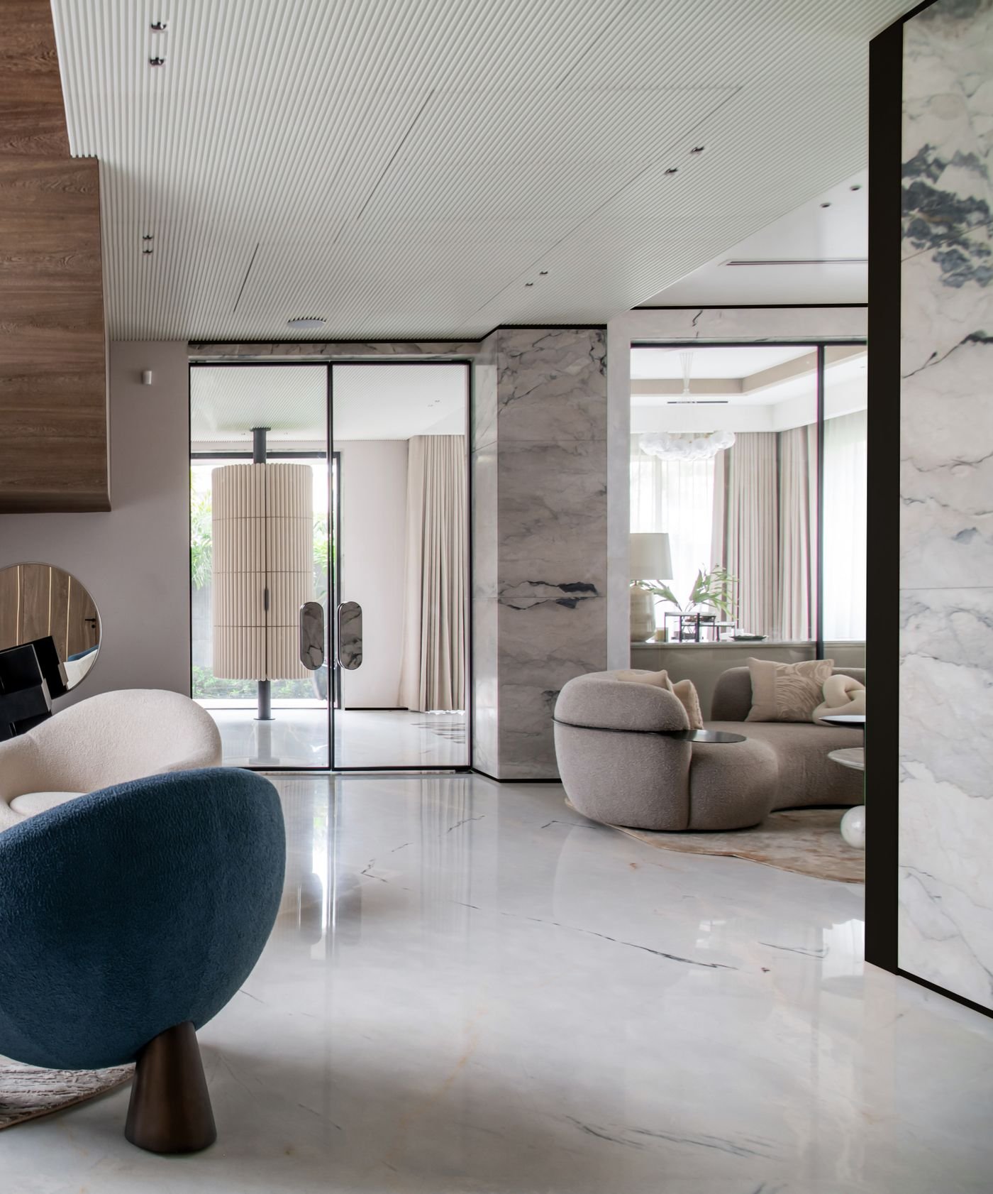 Luxury living room with marble-effect surfaces