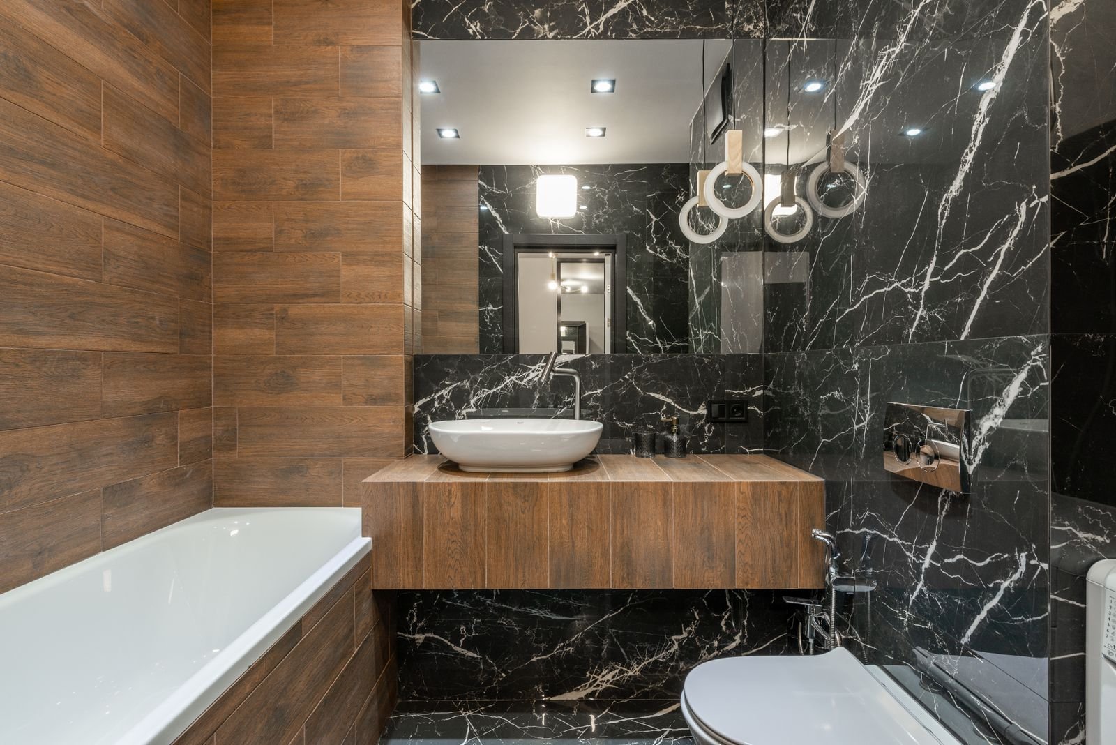 Marble and wood-effect bathroom material inspiration