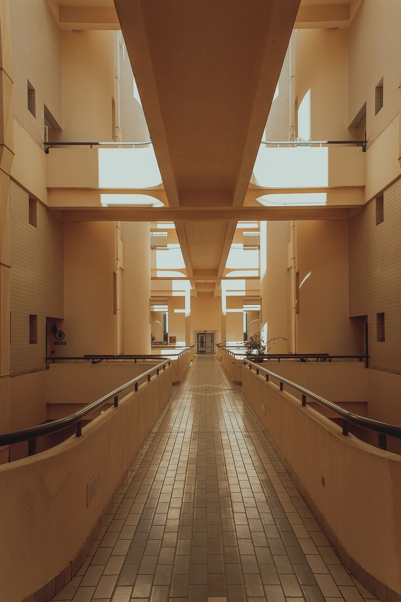 Modern tiled corridor demonstrating architectural floor applications