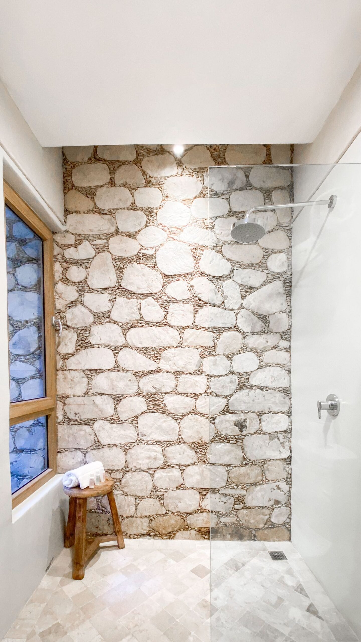 Contemporary bathroom with warm natural stone finish inspiration